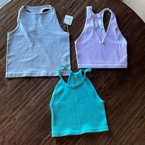 3 Free People Athletic/Leisure Tops. All like new, one with tags.
